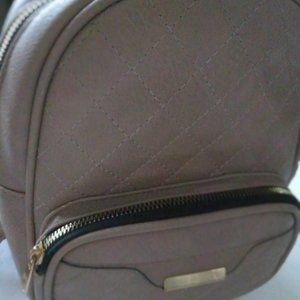 Backpack-style purse taupe approx. 10" high x 8" wide x 3" deep